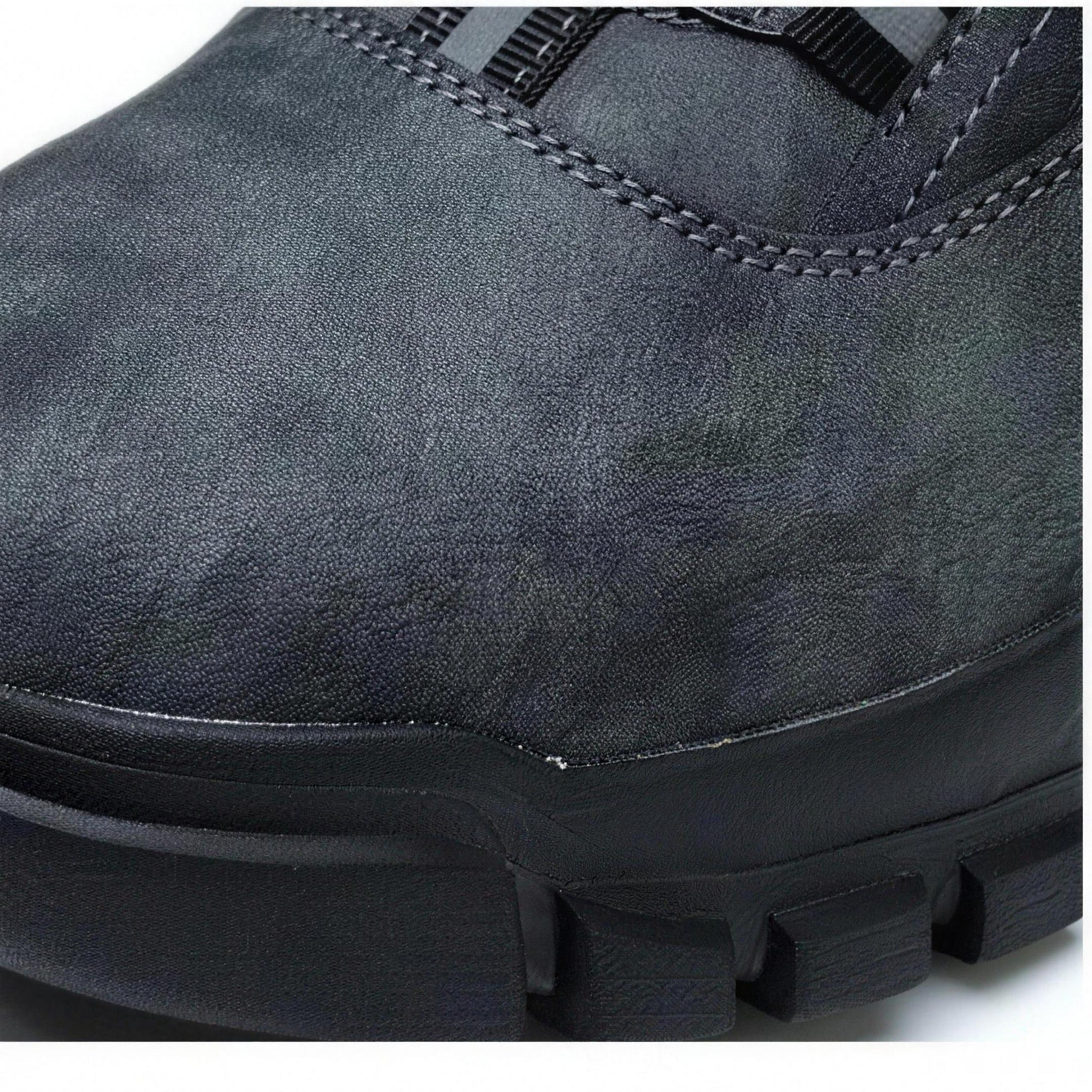 Close-up of gray steel toe boot toe and lugged sole | Chaps London