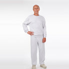 Man wearing light grey crew neck sweatshirt and matching jogger tracksuit | Chaps London