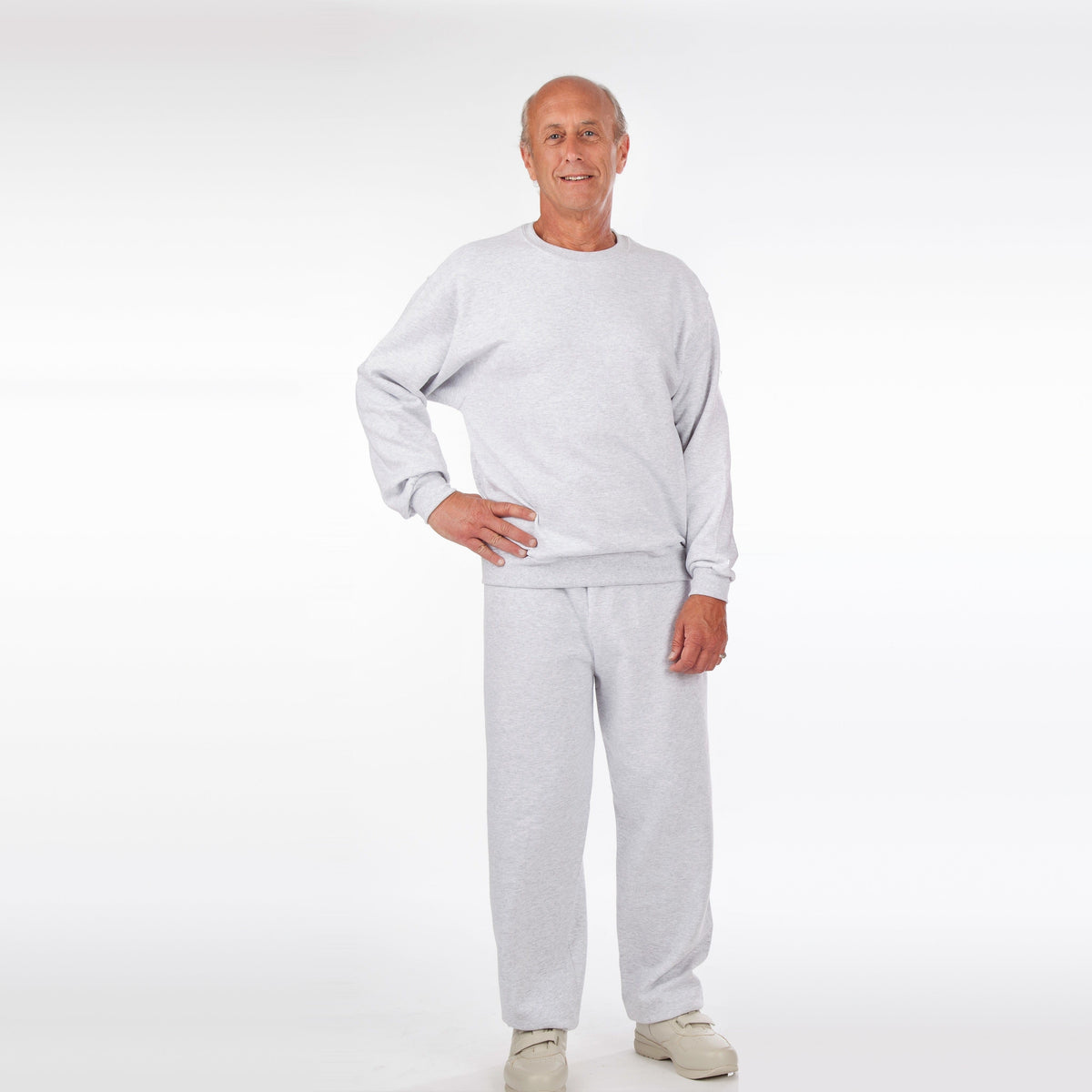 Man wearing light grey crew neck sweatshirt and matching jogger tracksuit | Chaps London
