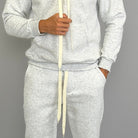 Man wearing grey heathered hoodie and jogger tracksuit with drawstring detail | Chaps London