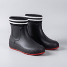 Black ankle wellies with striped cuffs and red soles, shown unworn | Chaps London