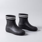 Black ankle wellies with striped knit cuffs, shown as a pair | Chaps London