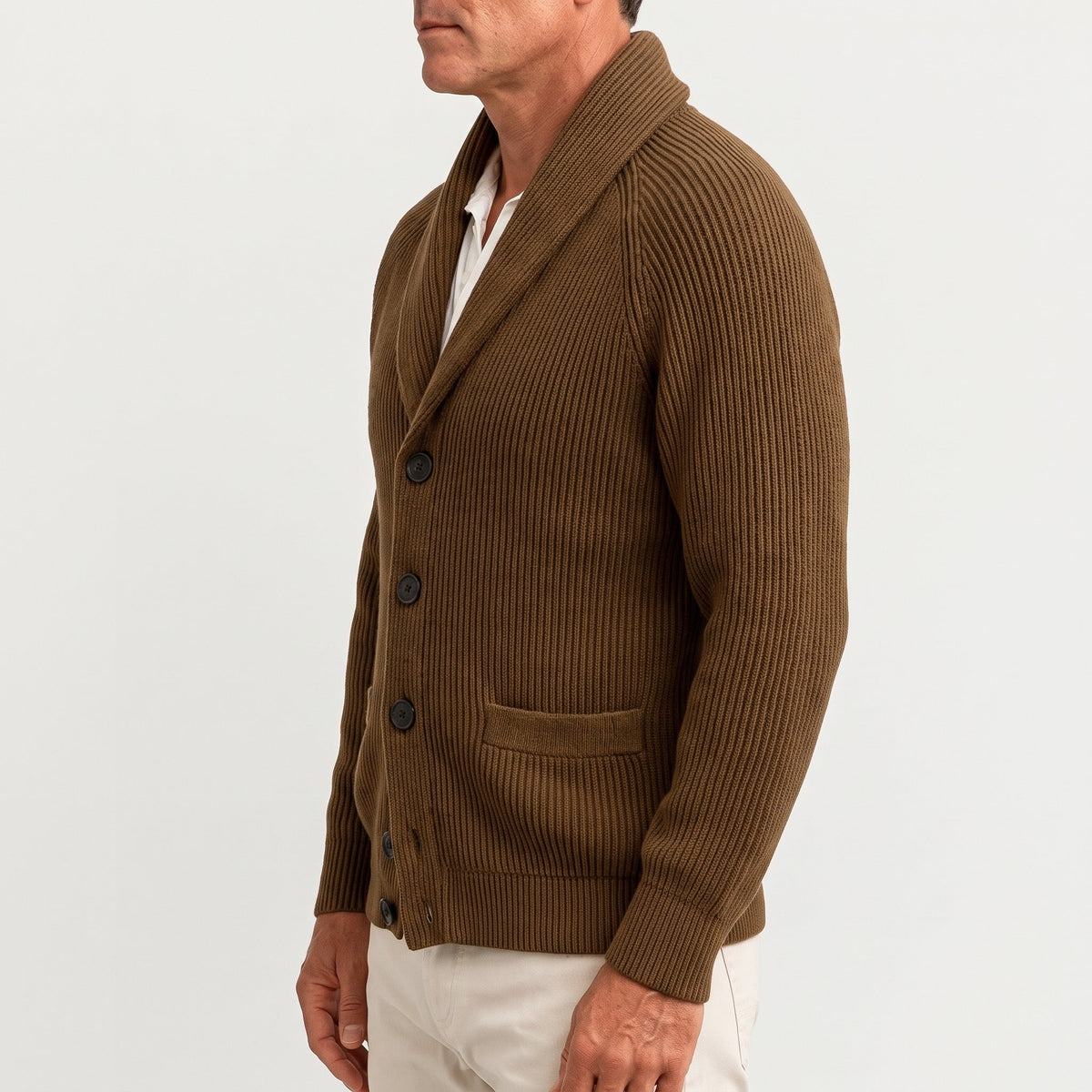 Man wearing brown ribbed knit shawl collar cardigan with buttons, side view | Chaps London