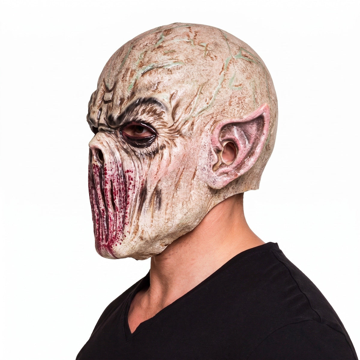 Man wearing beige alien monster mask with pointed ears, side view | Chaps London