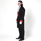 Man wearing black vampire coat with red cuffs and sunglasses | Chaps London