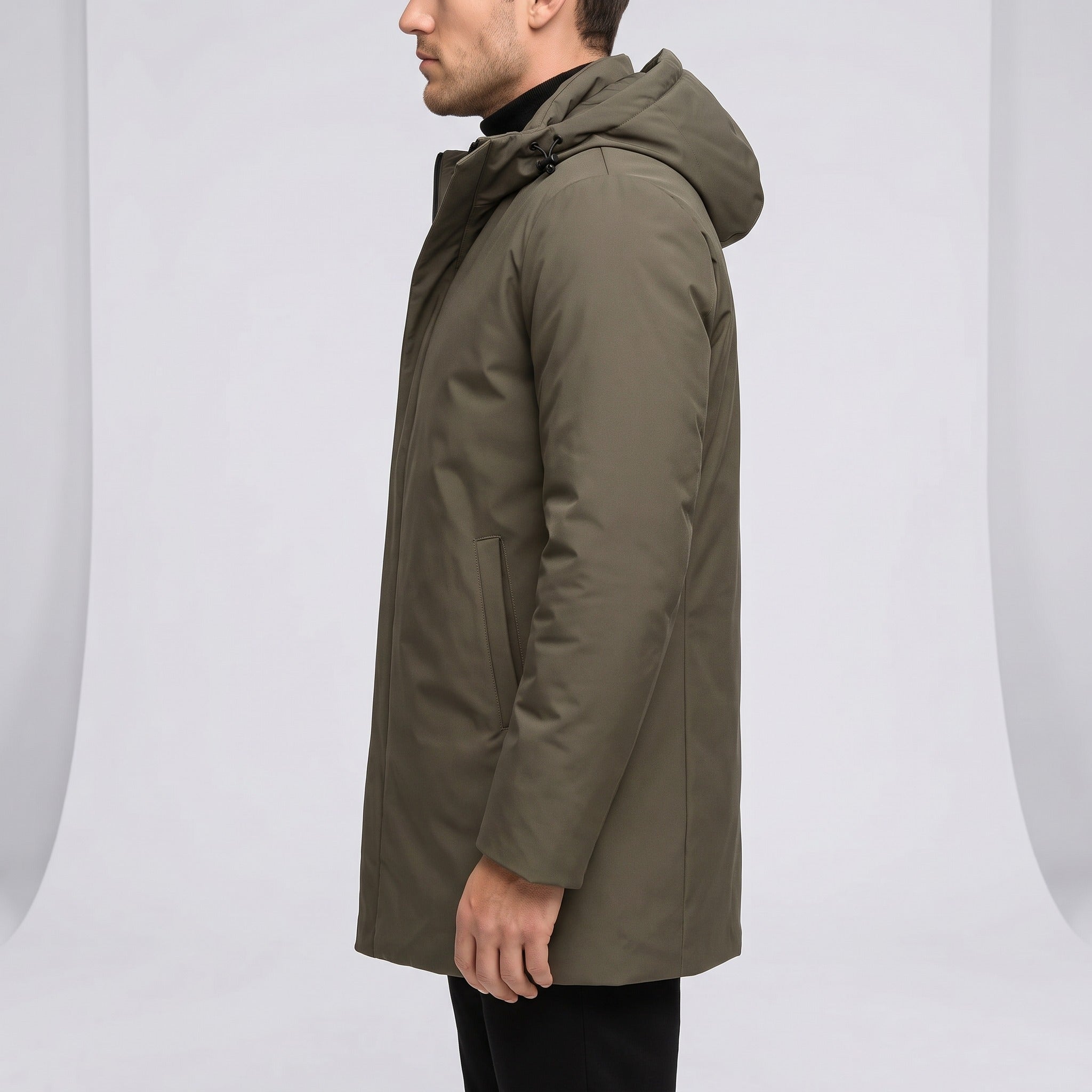 Olive green hooded coat worn by man, side view | Chaps London