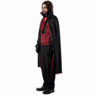 Man wearing black cape, red waistcoat and black trousers, Dracula costume | Chaps London