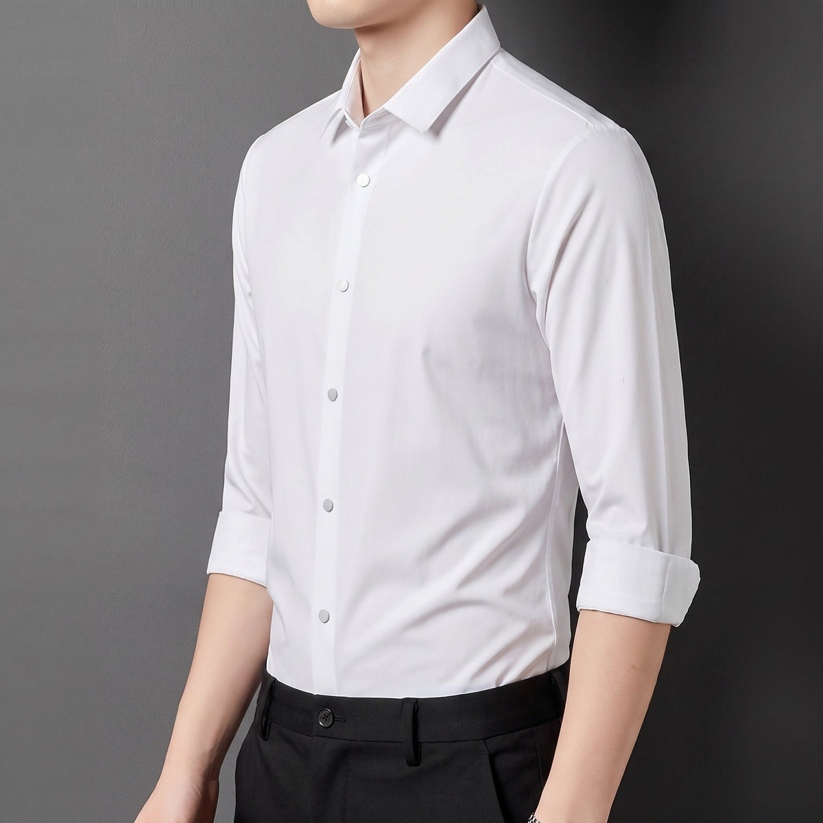 White point collar long sleeve shirt worn by man, paired with black trousers | Chaps London