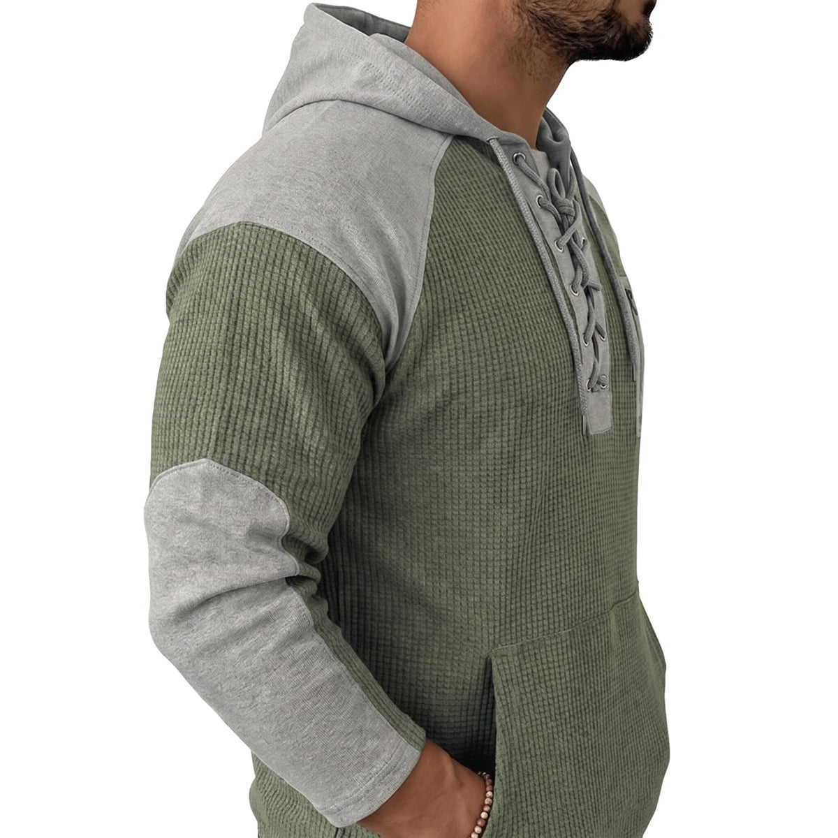 Man wearing green and grey lace-up hoodie with raglan sleeves, side view | Chaps London