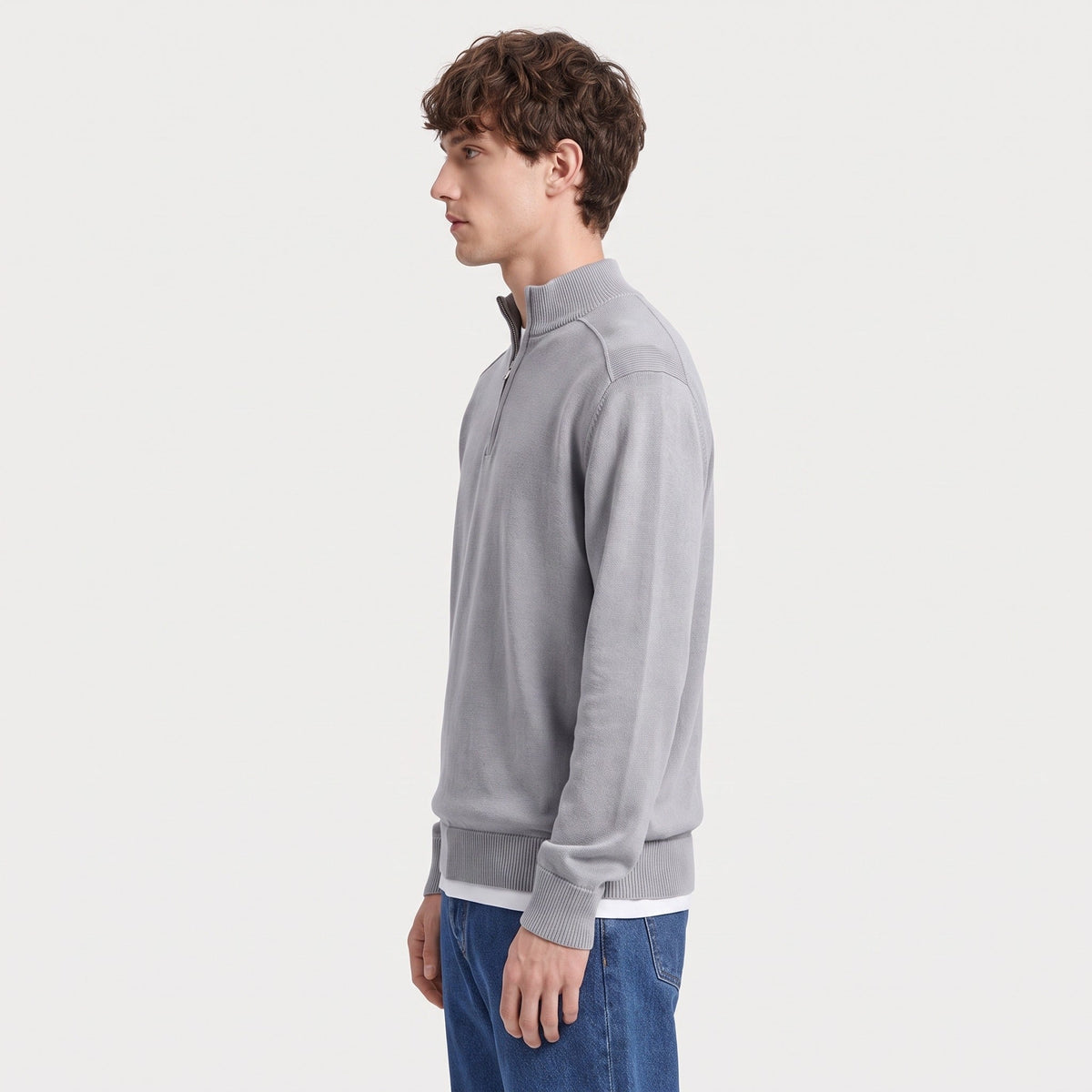 Grey wool-blend half-zip jumper worn by man, side view, blue jeans | Chaps London