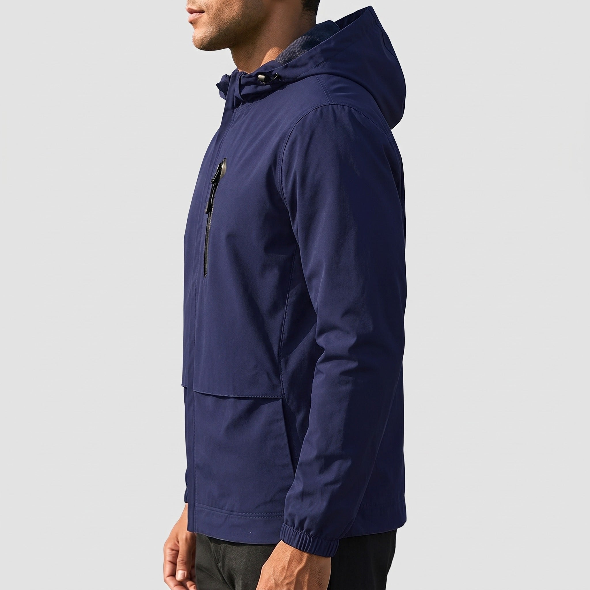 Man wearing navy hooded rain jacket with zip chest pocket, side view | Chaps London