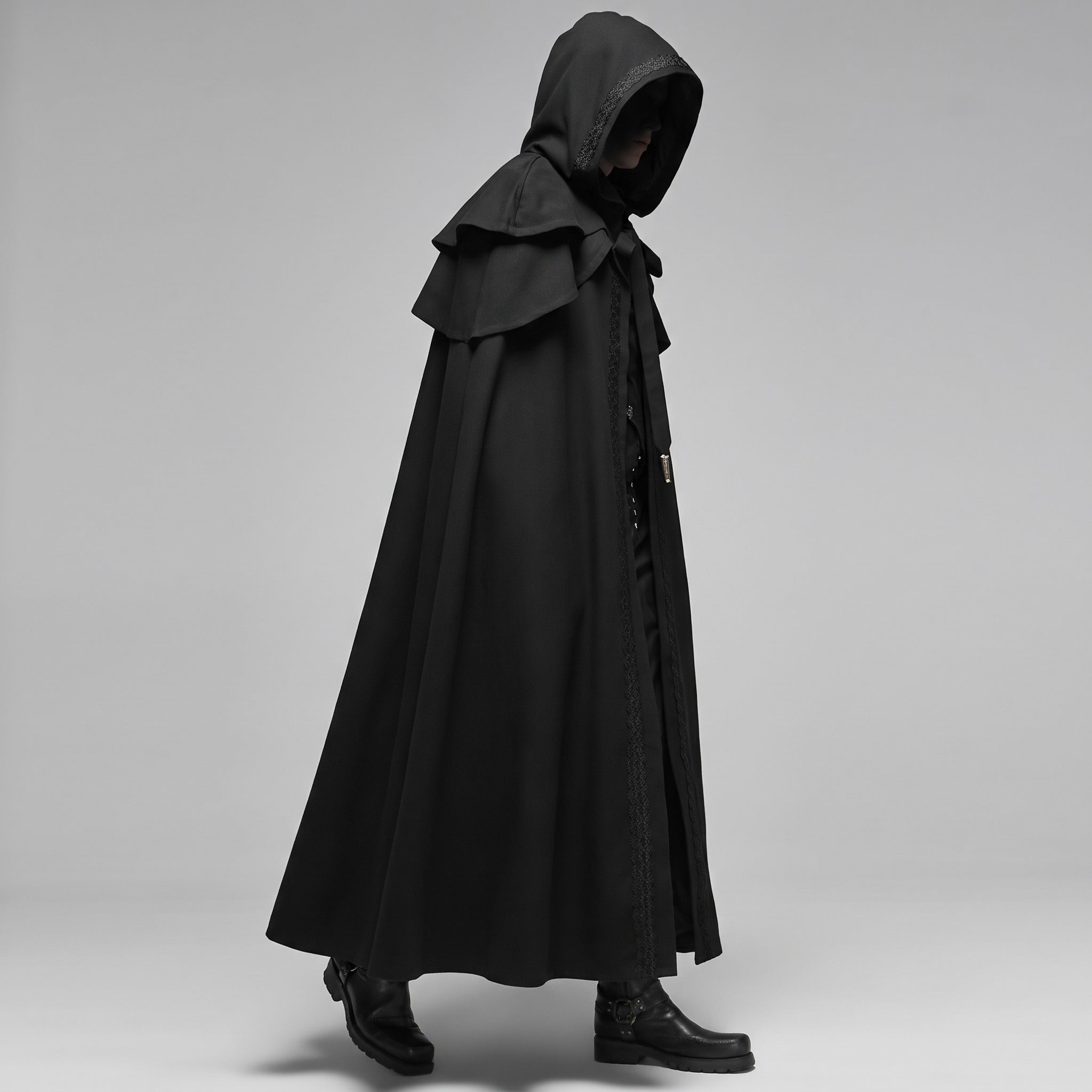 Man wearing black hooded gothic cloak, side view, full length | Chaps London