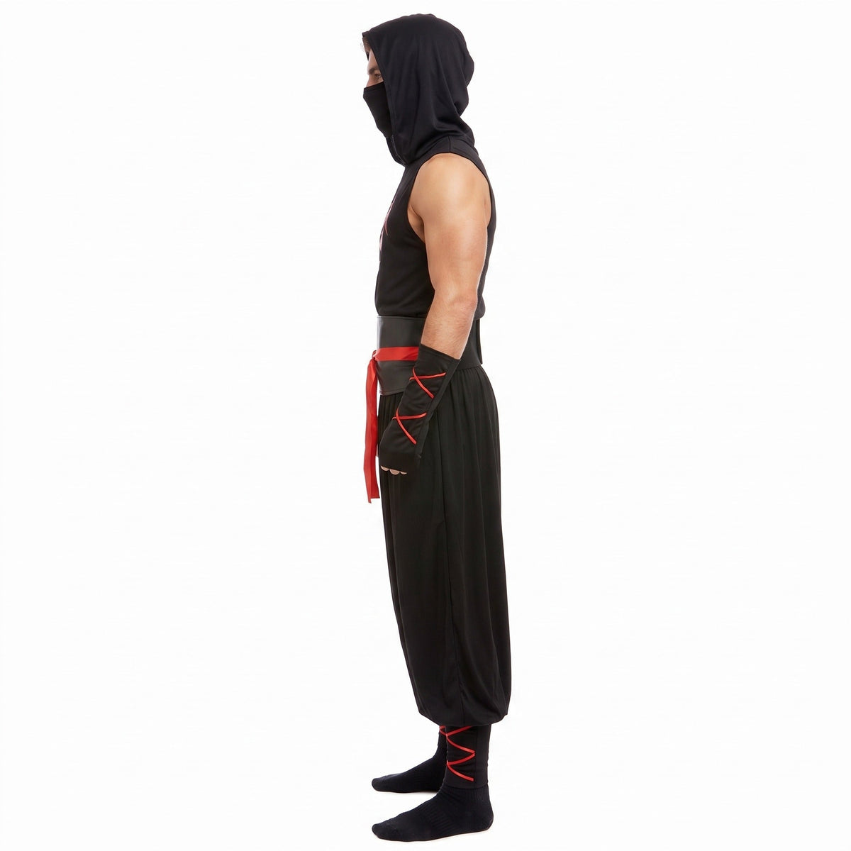 Black ninja costume with red accents worn by man, side view | Chaps London