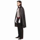 Man wearing black cape, gray waistcoat, white gloves, side profile view | Chaps London
