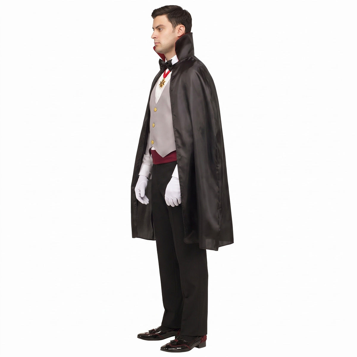 Man wearing black cape, gray waistcoat, white gloves, side profile view | Chaps London