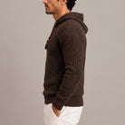 Man wearing brown basket weave knit hoodie with wooden toggle buttons, side view | Chaps London