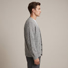 Man wearing grey ribbed knit cardigan with buttons, shown in profile view | Chaps London