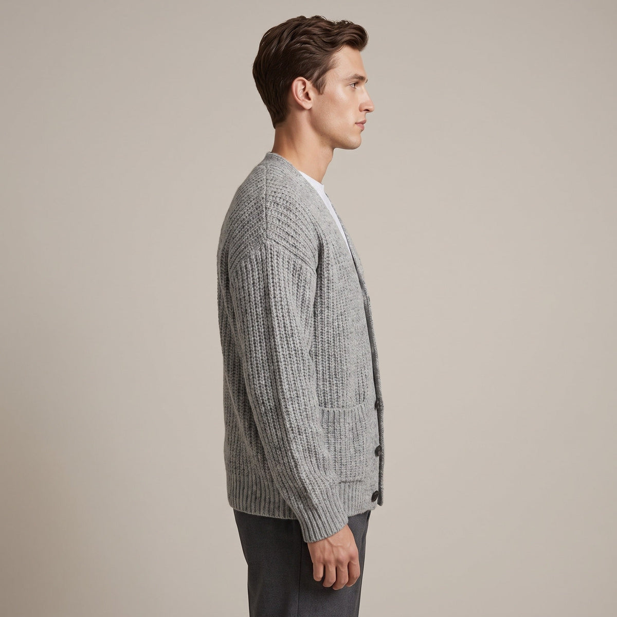 Man wearing grey ribbed knit cardigan with buttons, shown in profile view | Chaps London