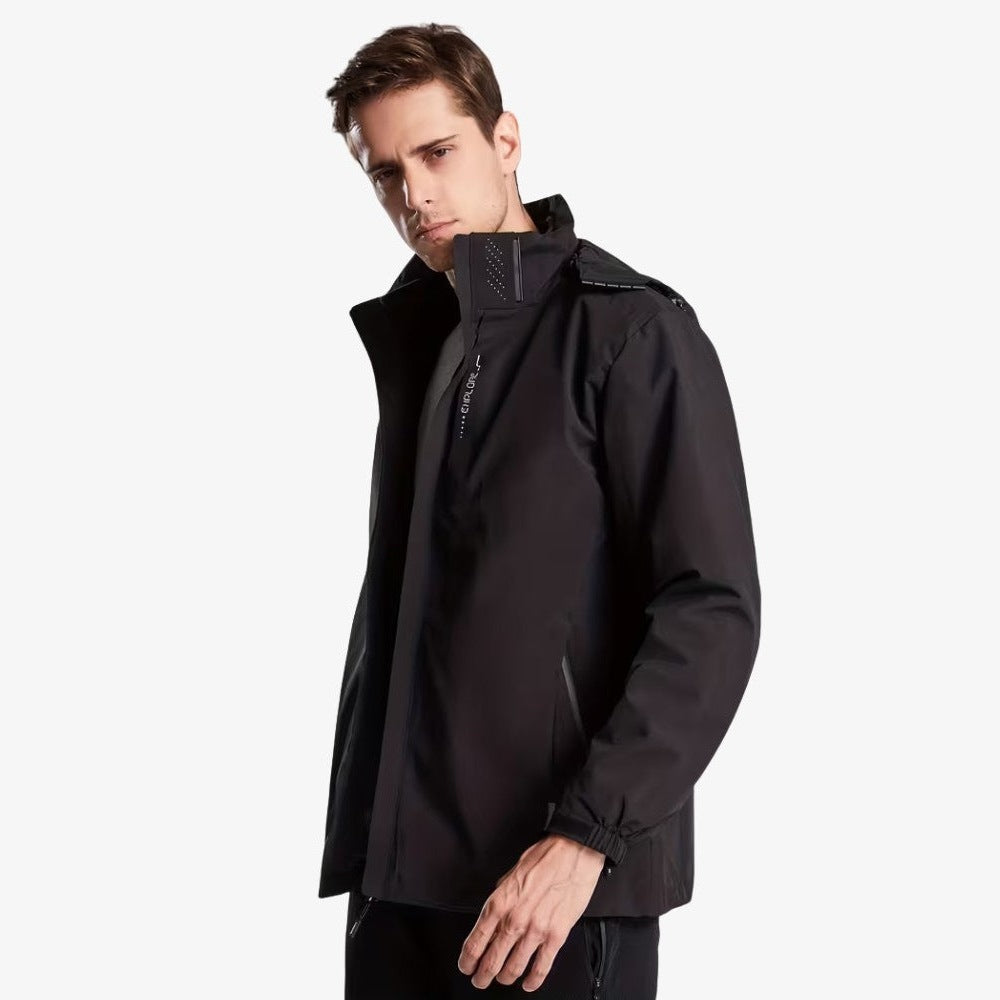 Man wearing black waterproof hooded rain jacket with standing collar, side view | Chaps London