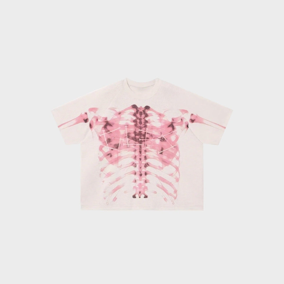 Pale pink oversized T-shirt with pink ribcage skeleton print, shown flat | Chaps London