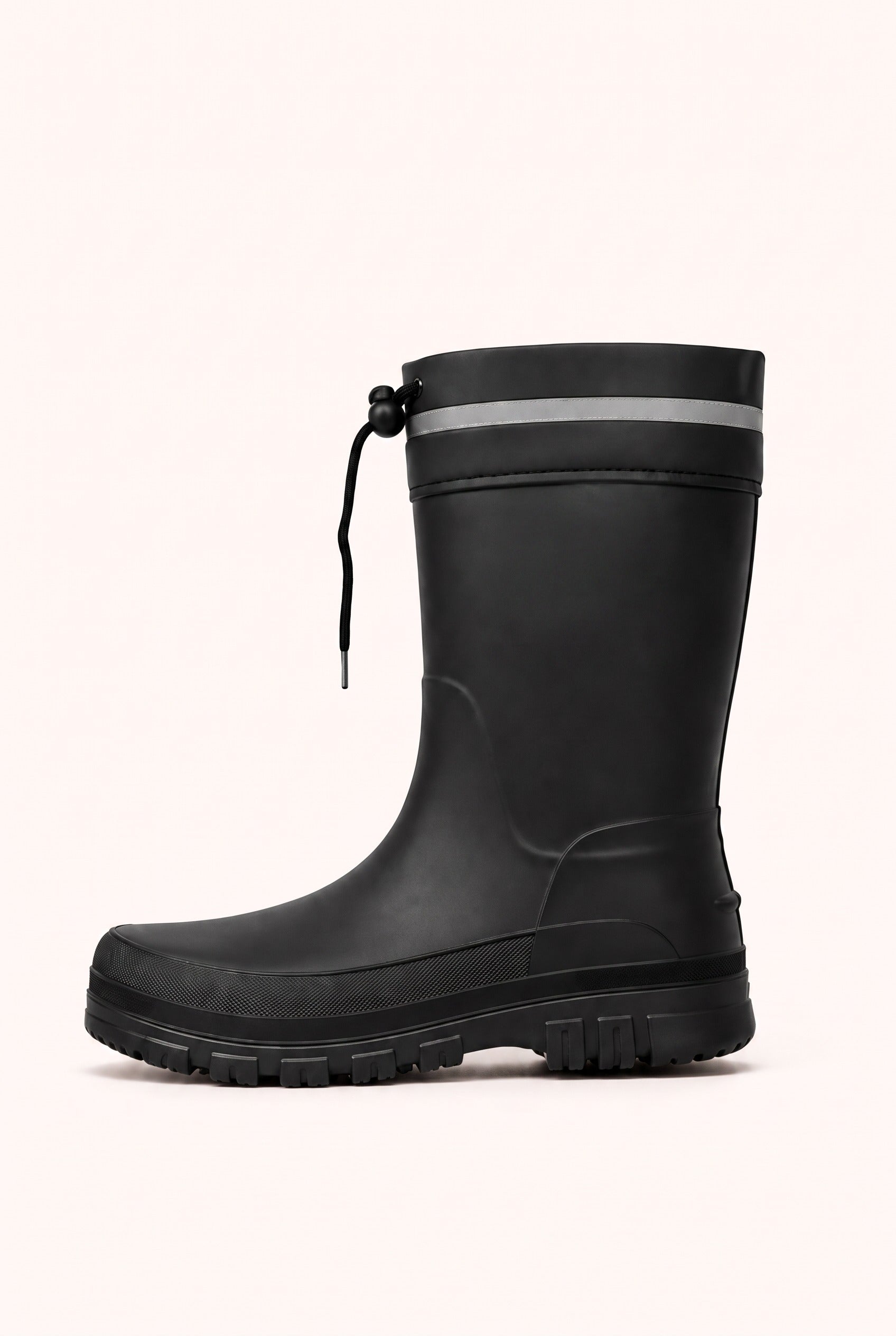 Side view of a black mid calf rain boot with a black lugged sole, a reflective band and a drawstring at the top.