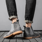 Gray faux suede Chelsea boots worn on feet with rolled cuffed jeans | Chaps London