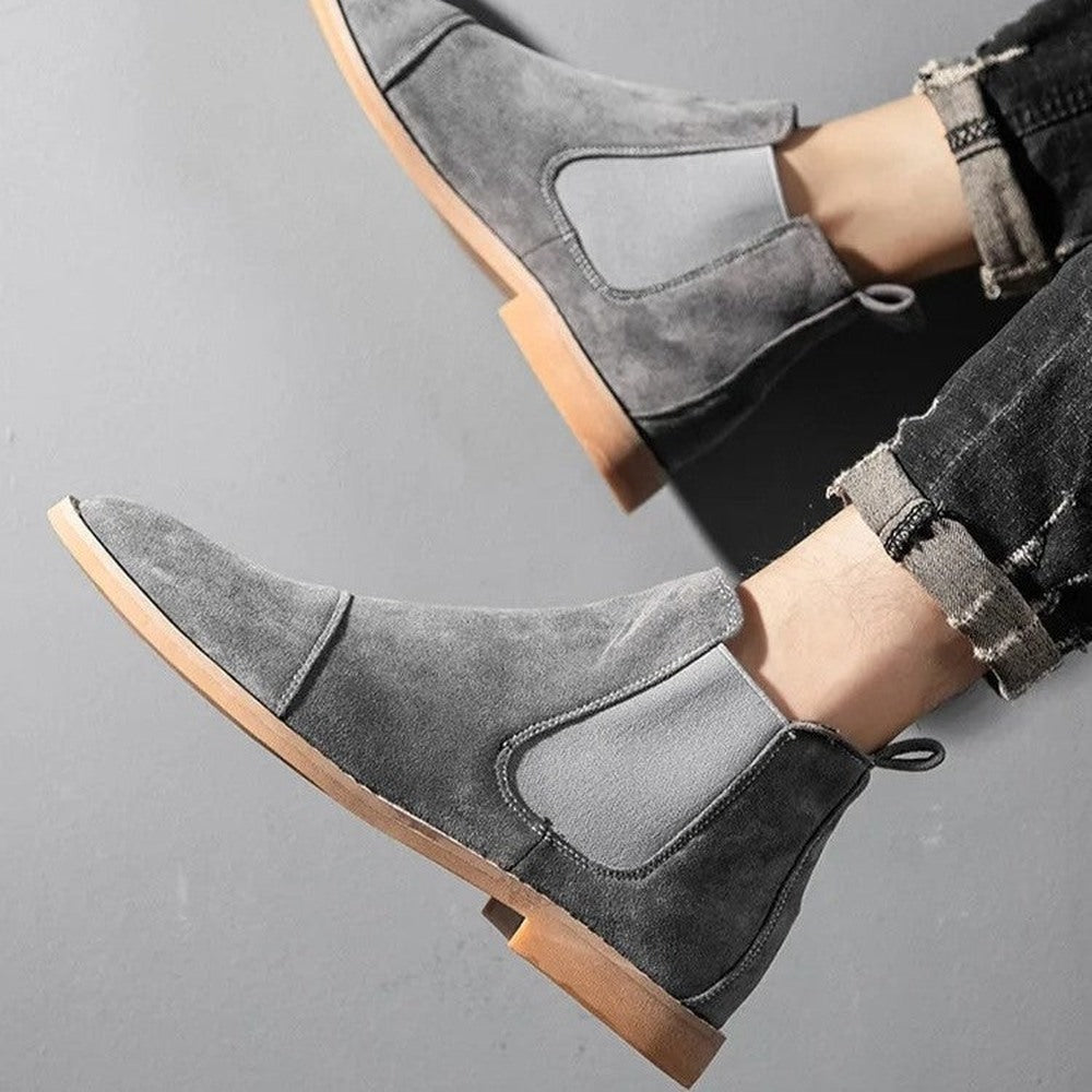 Gray faux suede Chelsea boots worn on feet with ripped jeans | Chaps London
