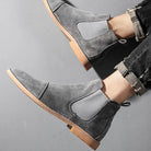 Gray faux suede Chelsea boots worn on feet with ripped jeans | Chaps London
