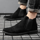 Black faux suede Chelsea ankle boots worn by man with jeans | Chaps London