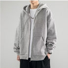 Gray oversized zip hoodie worn by man, dropped shoulders, casual outfit | Chaps London