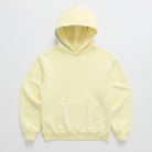 Pale yellow oversized hoodie with striped drawstring, shown flat on background | Chaps London