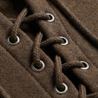 Close-up of brown hoodie lace-up collar with metal eyelets and cord | Chaps London