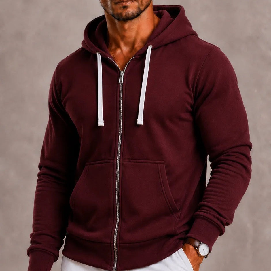 Man wearing burgundy zip-up hoodie with white drawstrings, unzipped over bare chest | Chaps London
