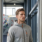 Gray zip hoodie with orange accents worn by man indoors | Chaps London
