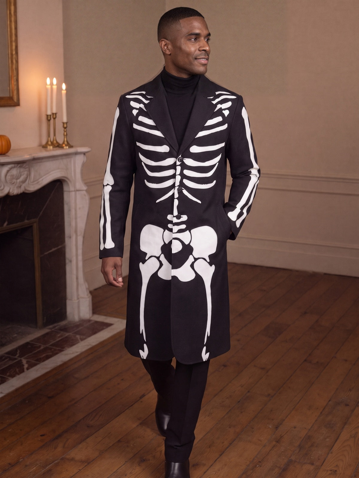 Man walking in the long black skeleton print costume coat