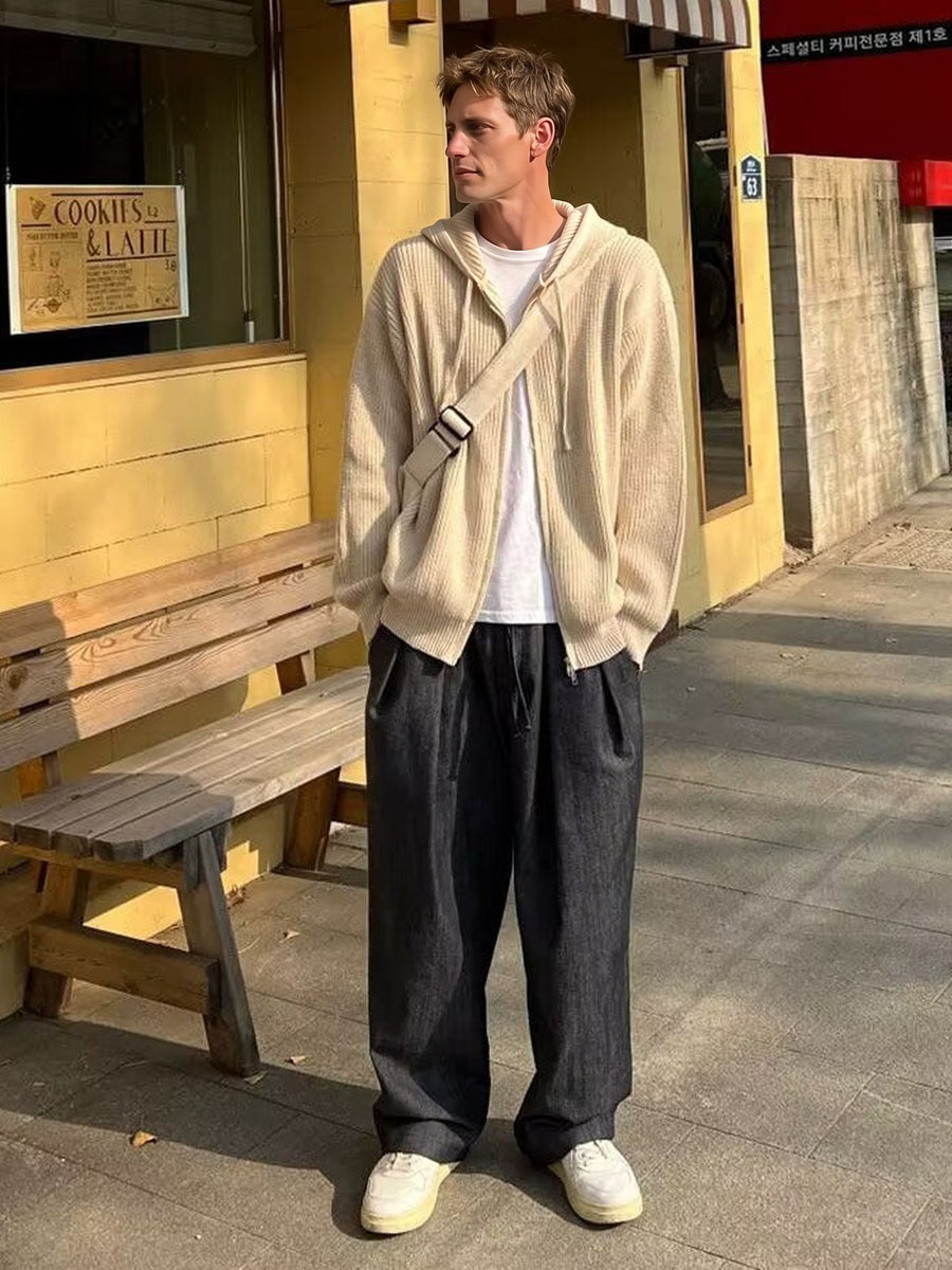 Men's knitted zip hoodie in beige, worn, front view