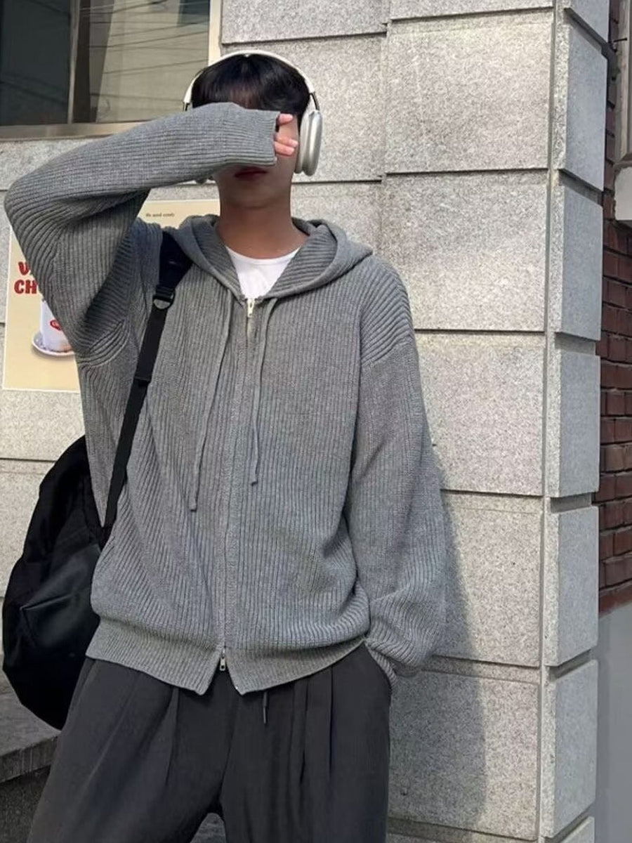 Men's knitted zip hoodie in grey, worn, front view