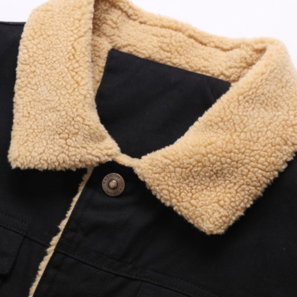 Black jacket with sherpa collar close-up, snap button fastening, plush cream lining visible | Chaps London