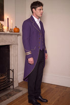 House model wearing the Victorian tailcoat with gold trim
