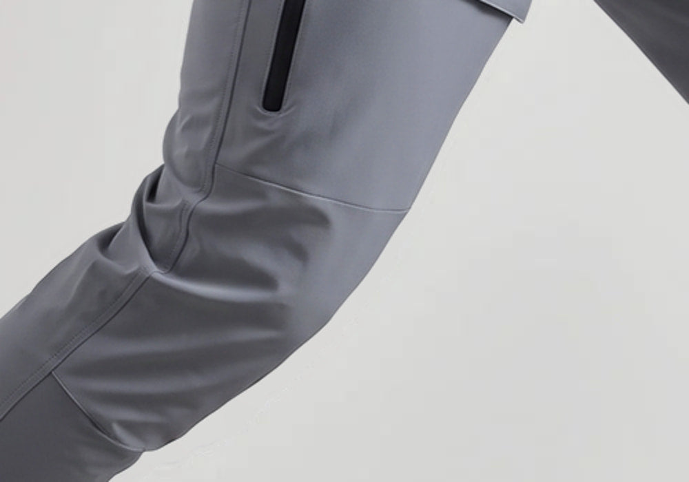 Gray stretch fabric jogger close-up showing knee area worn by person | Chaps London